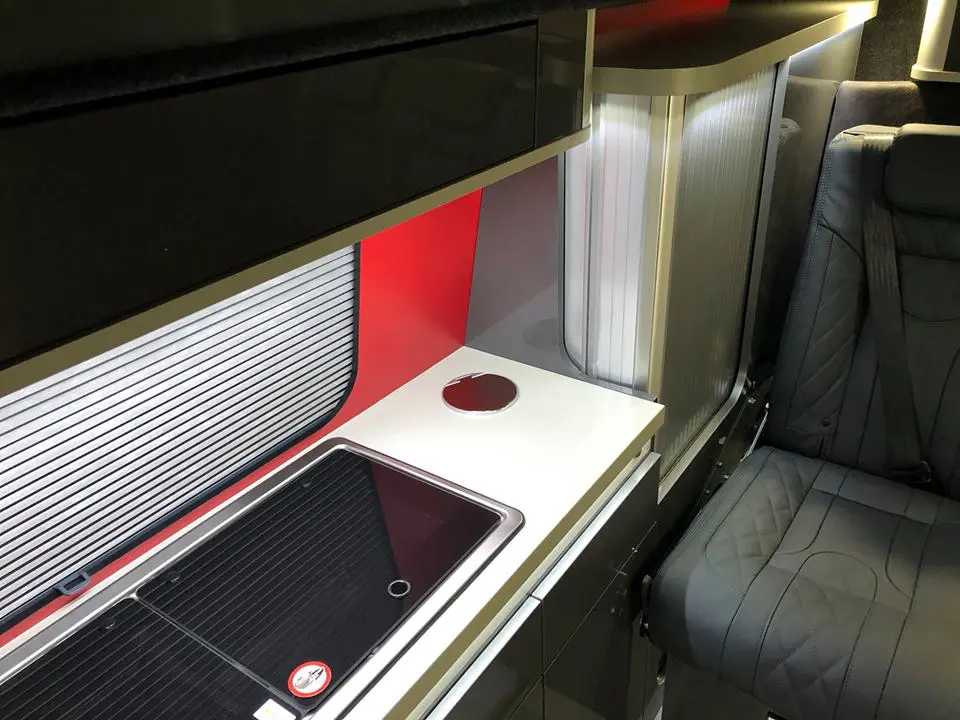 The Newstead Campervan interior in red